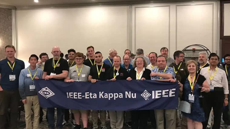 SoutheastCon reception attendees pose for a group photo.
