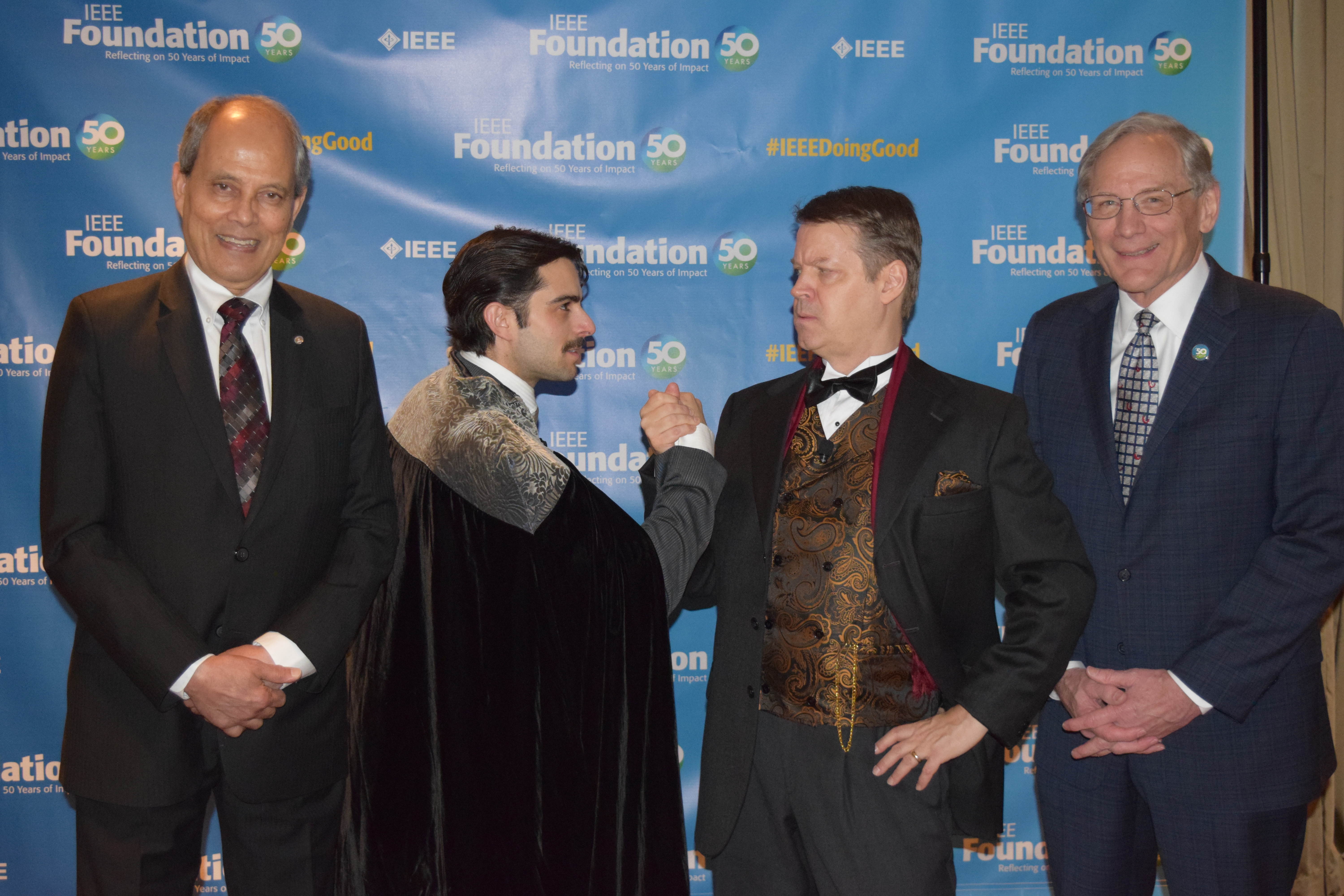 Saifur, John, Nikola Tesla, and Thomas Edison Celebrate the IEEE Foundation 50th Anniversary.
