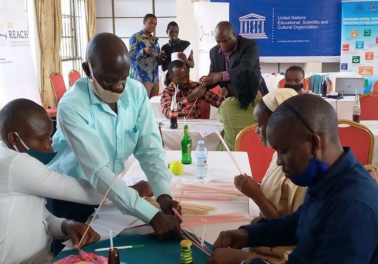 STEM Mentorship Teachers work on a hands-on activity during a STEM Mentorship Program facilitated by the Uganda National Commission for UNESCO with support from IEEE Foundation donors.