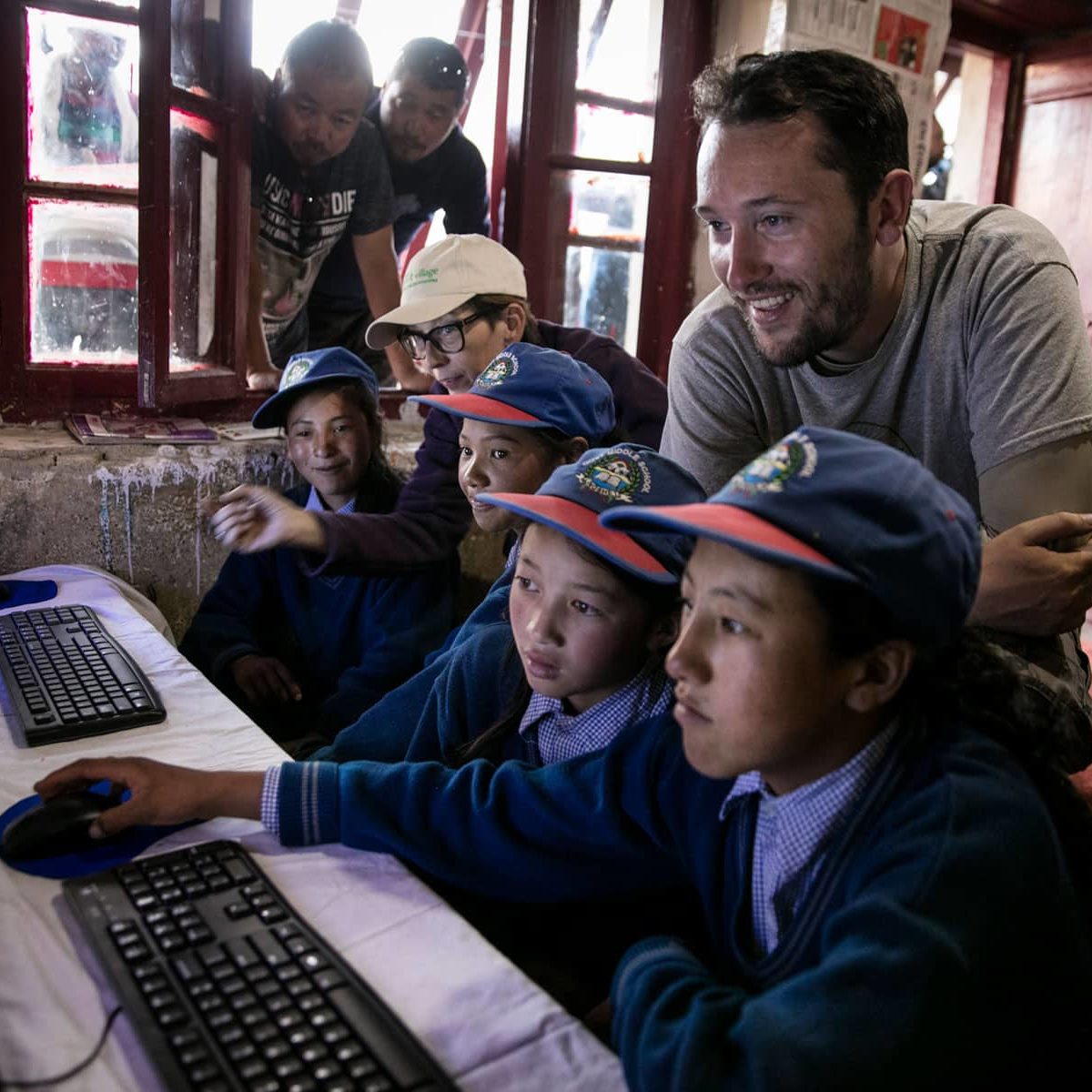 IEEE Volunteer with children at Smart Village